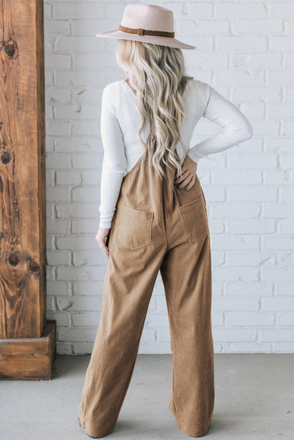 Black solid pocketed loose-fitting corduroy overall.