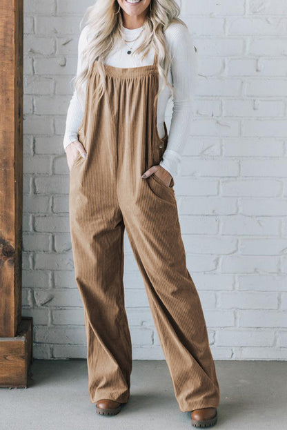 Black solid pocketed loose-fitting corduroy overall.