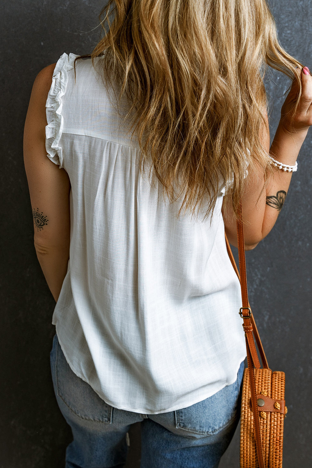 Chic White Ruffled Tank Top with Buttoned Neck and Split Design