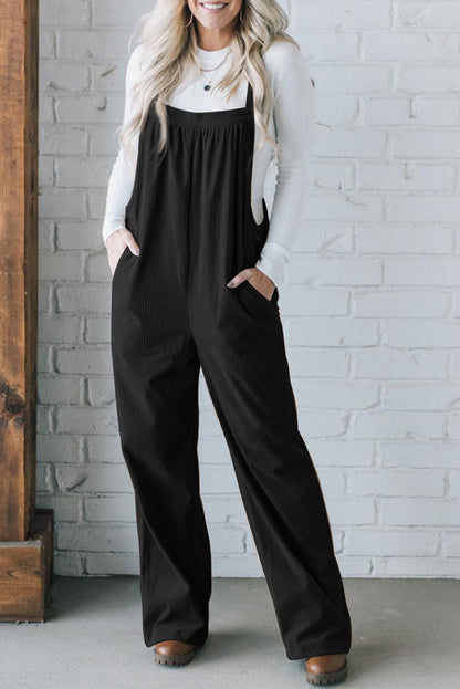 Black solid pocketed loose-fitting corduroy overall.