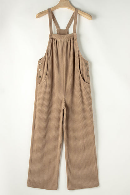 Black solid pocketed loose-fitting corduroy overall.